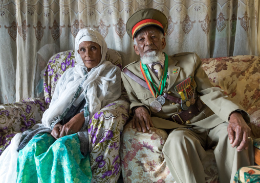 Veteran from the italo-ethiopian war in army uniform with his wife, Addis Ababa Region, Addis Ababa, Ethiopia