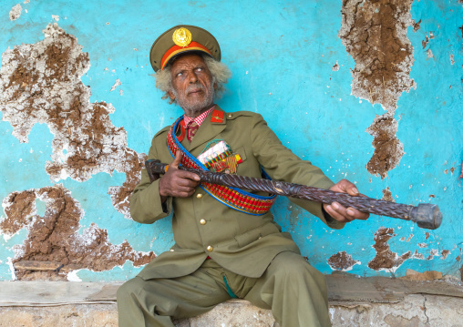Ethiopian veteran from the italo-ethiopian war in army uniform holding a stick, Addis Ababa Region, Addis Ababa, Ethiopia
