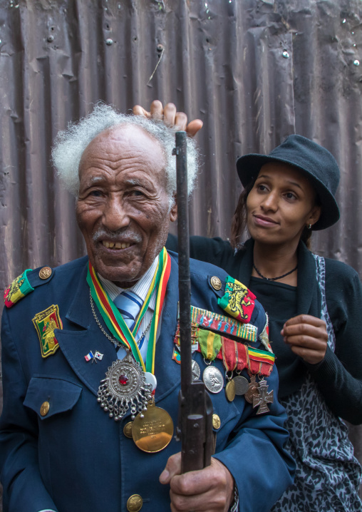 Ethiopian veteran from the italo-ethiopian war with his daughter, Addis Ababa Region, Addis Ababa, Ethiopia