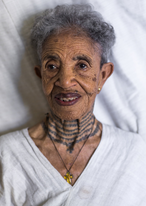 Ethiopian veteran woman from the italo-ethiopian war with tattoes in the neck, Addis Ababa Region, Addis Ababa, Ethiopia