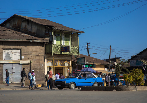 Street scene with a blue taxi and an old house, Addis Ababa Region, Addis Ababa, Ethiopia