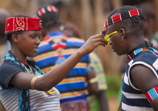 Bana Tribe Young People With Colourful Headbands And Sunglasses, Key Afer, Omo Valley, Ethiopia