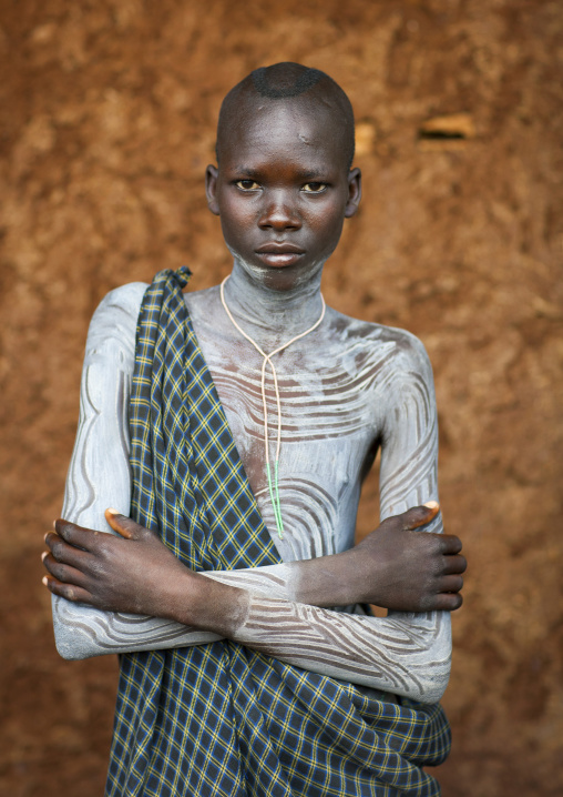 Suri tribe boy with a painted body, Kibish, Omo valley, Ethiopia