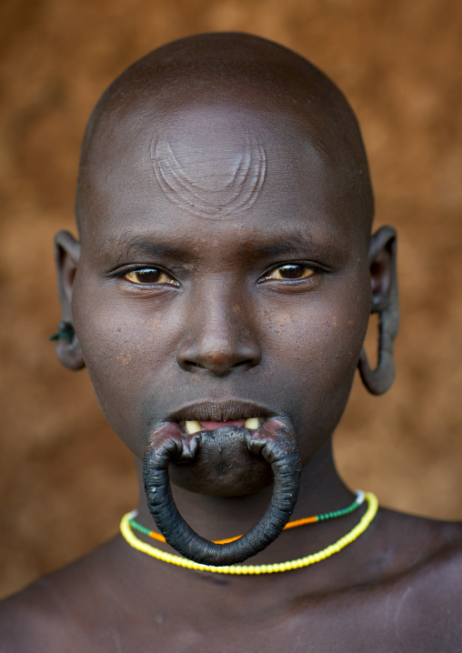 Suri tribe woman with an enlarged lip, Kibish,  Omo valley, Ethiopia