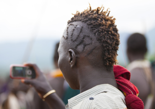 Stylish haircut on a Suri tribe man, Kibish, Omo valley, Ethiopia