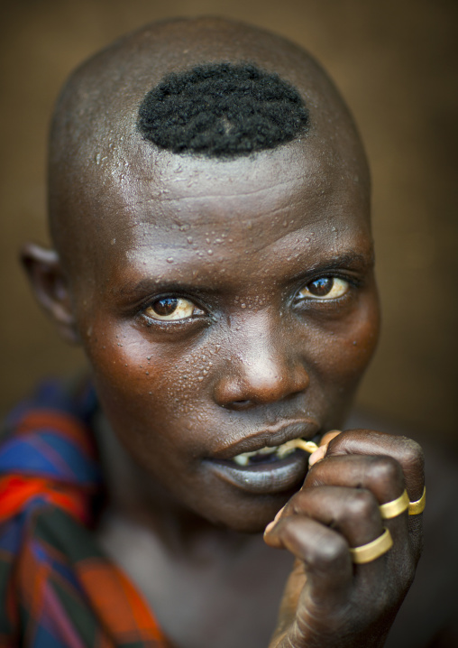 Bodi Tribe Woman Chewing A Stick, Hana Mursi, Omo Valley, Ethiopia