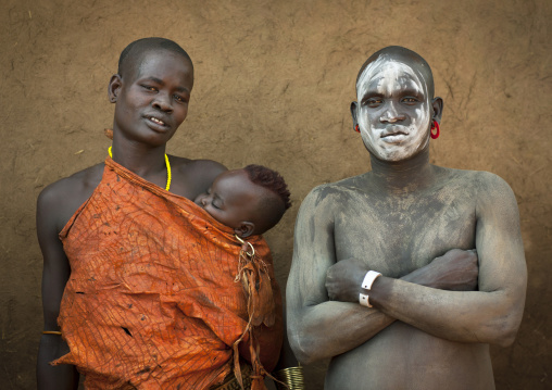 Bodi Tribe Woman With Her Baby And Hisband With Body Paintings, Hana Mursi, Omo Valley, Ethiopia