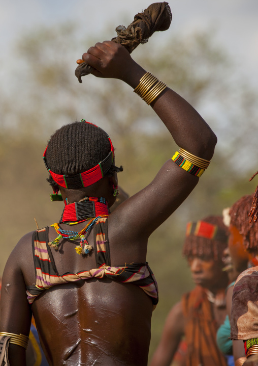 Hamer Tribe Woman  Asking To Be Whipped During Bull Jumping Ceremony, Turmi, Omo Valley, Ethiopia