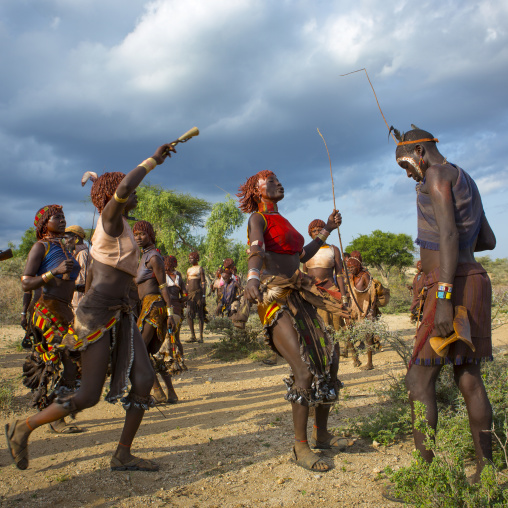 Women Arguing To Be Whipped By The Maze During Bull Jumping Ceremony, Turmi In Hamar Tribe, Omo Valley, Ethiopia