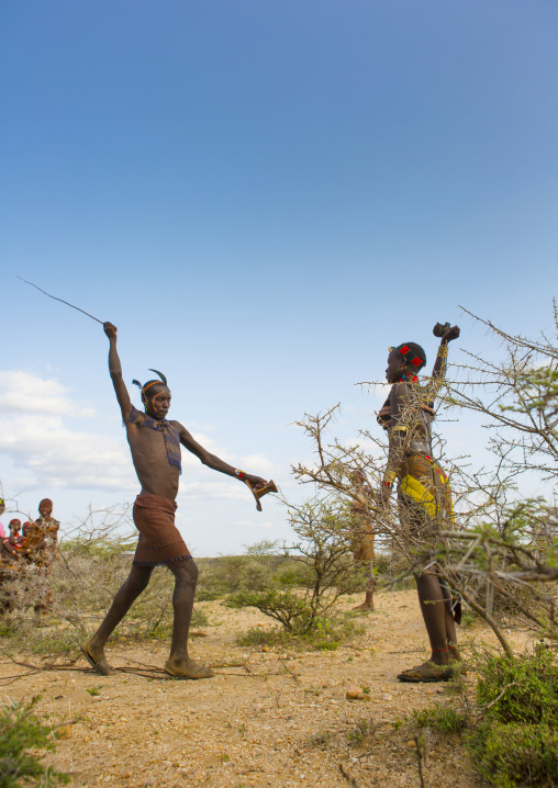 Whipping During Bull Jumping Ceremony, Turmi In Hamar Tribe, Omo Valley, Ethiopia
