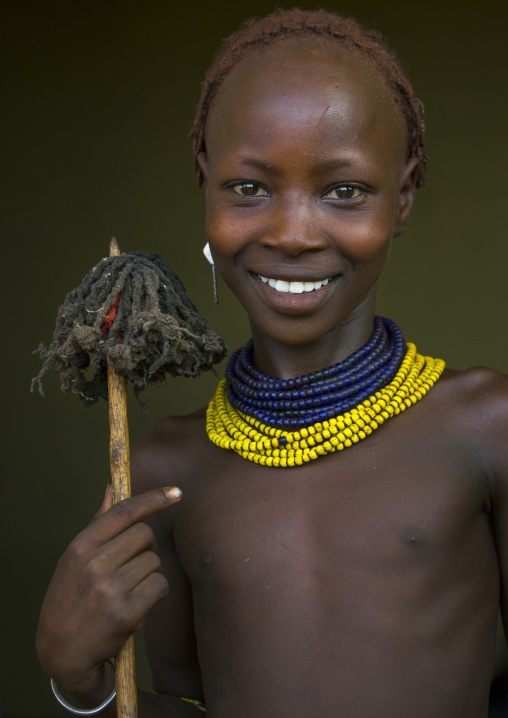 Dassanech Tribe Girl With Her Doll, Omorate, Omo Valley, Ethiopia