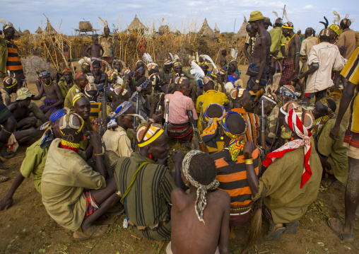 Dassanech Tribe Warriors Sharing Cow Meat During A Ceremony, Omorate, Omo Valley, Ethiopia