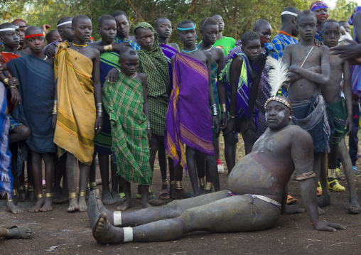 Bodi Tribe Fat Man Resting During Kael Ceremony, Hana Mursi, Omo Valley, Ethiopia