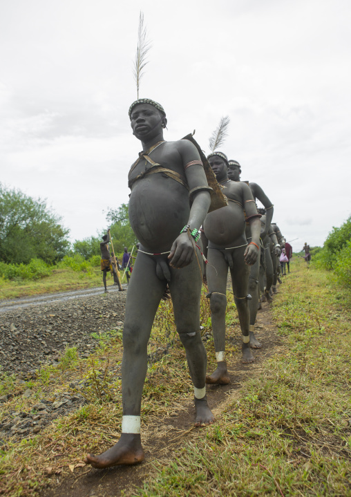 Bodi Tribe Fat Men Going To The Kael Ceremony, Hana Mursi, Omo Valley, Ethiopia