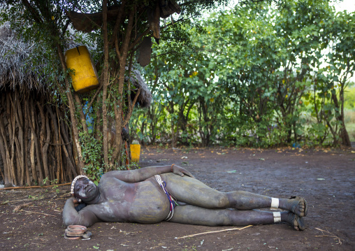 Bodi Tribe Fat Man Resting During Kael Ceremony, Hana Mursi, Omo Valley, Ethiopia