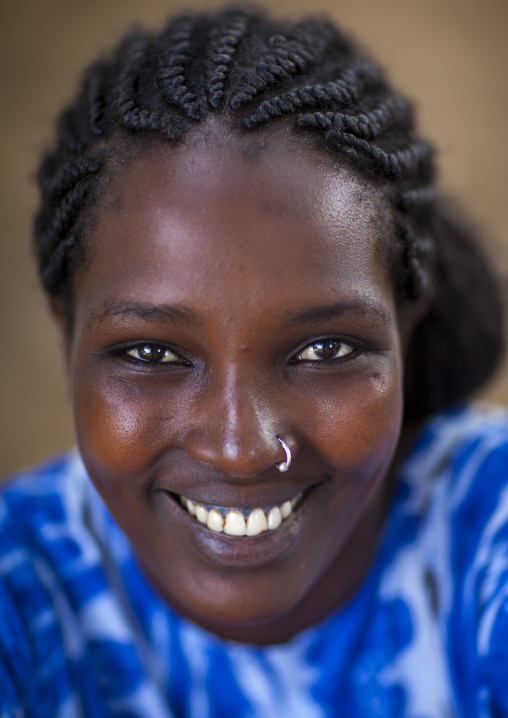 Smiling Ethiopian woman, Omorate, Omo valley, Ethiopia