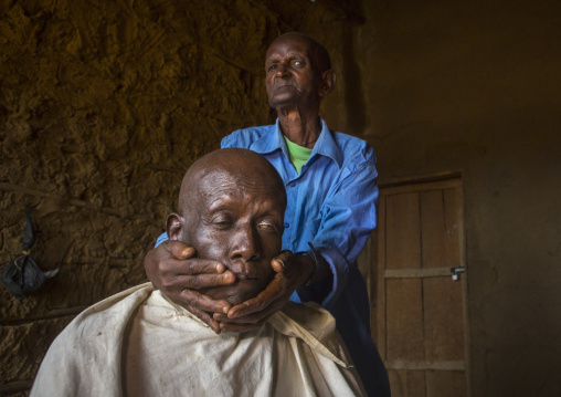 Barber in jinka, Omo valley, Ethiopia