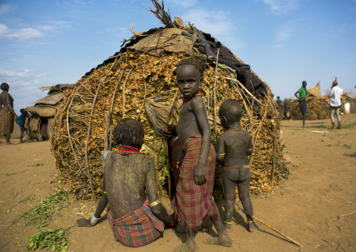 Dassanech Tribe Children Standing In Front Of His House, Omorate, Omo Valley, Ethiopia
