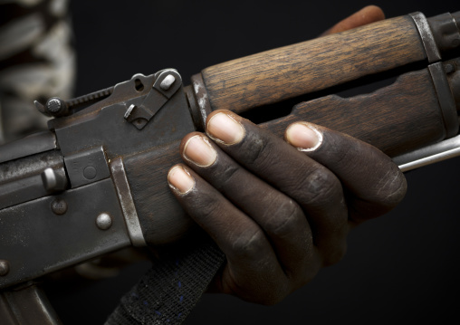 Detail Of A Kalashnikov Rifle Held In Hand Of Karo Man Ethiopia