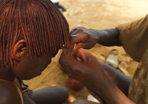 Bana Woman Getting Hair Dressed With Braids And Ochre Dye Omo Valley Ethiopia