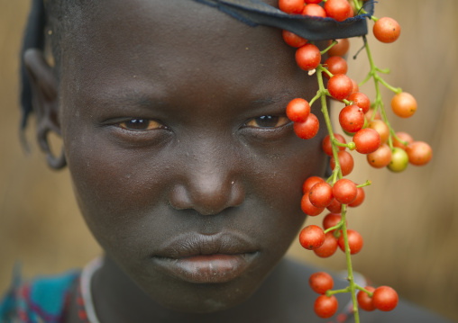 Red Fruits Portrait Of A Teenage Mursi Girl Ethiopia