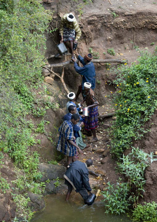 Group Of People Getting Water From The Singing Wells In Borana Tribe Area, Yabello, Yabello, Omo Valley, Ethiopia