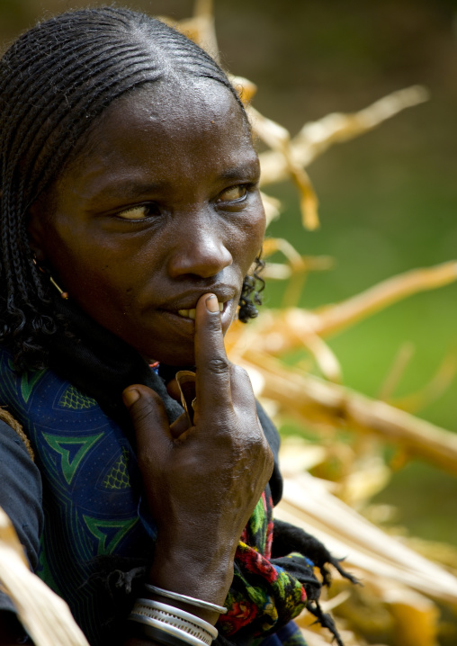 Braided Hair Borana Tribe Woman With Finger On Her Mouth, Omo Valley, Ethiopia
