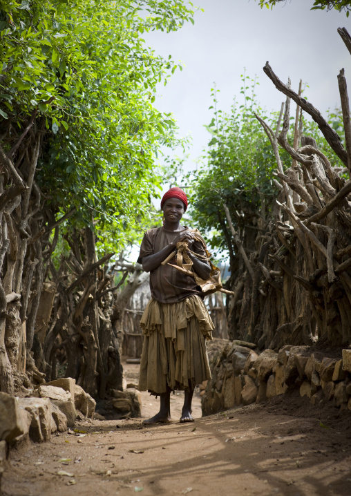 Portrait Of A Konso Tribe Woman Posing In Village Alley, Konso, Omo Valley, Ethiopia