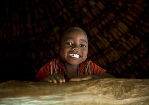 Portrait Of A Konso Tribe Kid With Toothy Smile, Omo Valley, Ethiopia