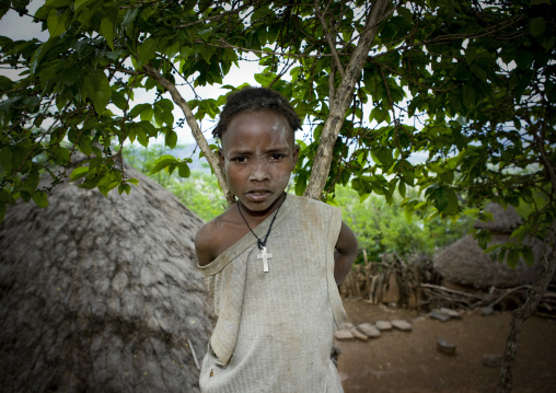 Portrait Of A Konso Tribe Kid With A Christian Cross, Omo Valley, Ethiopia