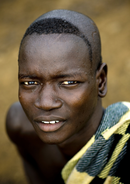 Portrait Of A Bodi Tribe Man With Shaved Head, Hana Mursi, Ethiopia
