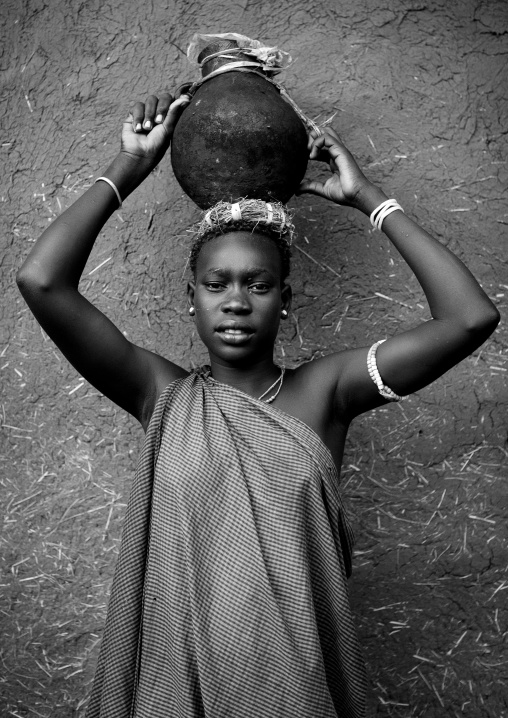 Bodi Tribe Woman Carrying A Clay Container On Head, Black And White Portrait, Omo Valley, Ethiopia