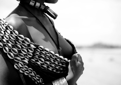 Black And White Photo, Close Up On The Chest Of Hamar Tribe Woman With Shell Necklace, Omo Valley, Ethiopia