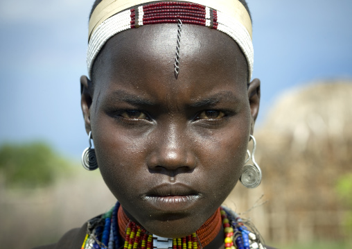 Portrait Of An Erbore Tribe Woman With Necklaces, Headband And Earrings, Weito, Omo Valley, Ethiopia