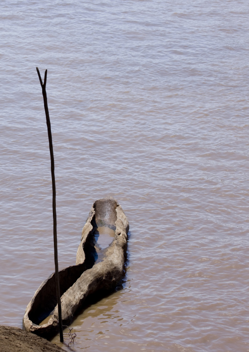 Trunk boat to cross the omo river, Omorate, Omo valley, Ethiopia