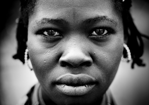 Black And White Close Up Portrait Of A Hamar Woman With Stranded Hair And Earrings, Turmi, Omo Valley, Ethiopia