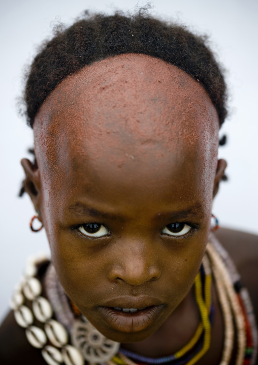 Portrait Of A Hamar Tribe Kid With Shaved Forehead, Turmi, Omo Valley, Ethiopia