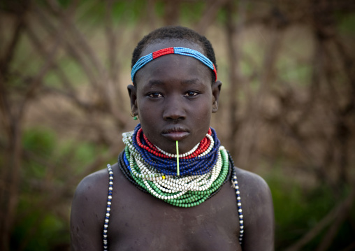 Young Beaded Jewels Nyangatom Tribe Woman Head And Shoulders Portrait, Omo Valley, Ethiopia
