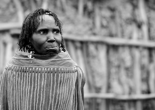 Black And White Portrait Of A Topossa Woman, With Traditional Clothes, Omo Valley, Kangate, Ethiopia