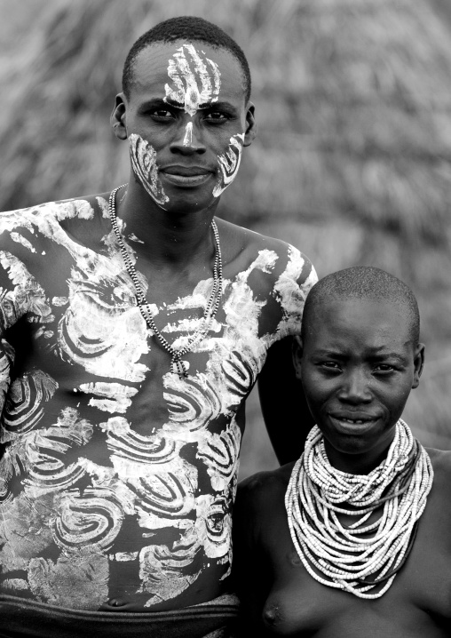Black And White Portrait Of A Karo Couple Tribe With Traditional Body Paintings And Necklaces, Korcho Village, Ethiopia