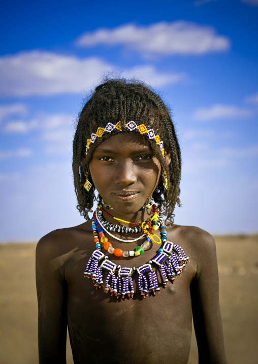 Afar tribe girl with big necklace and braided hair, Assaita, Afar regional state, Ethiopia