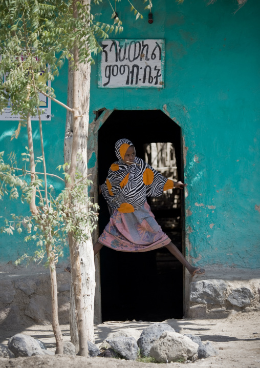 Girl at the entrance of her house, Assaita, Afar regional state, Ethiopia