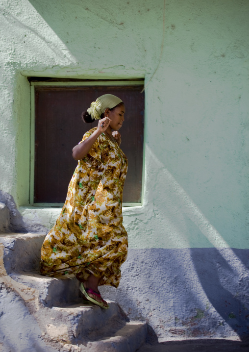 Woman on stairs, Assaita, Afar regional state, Ethiopia