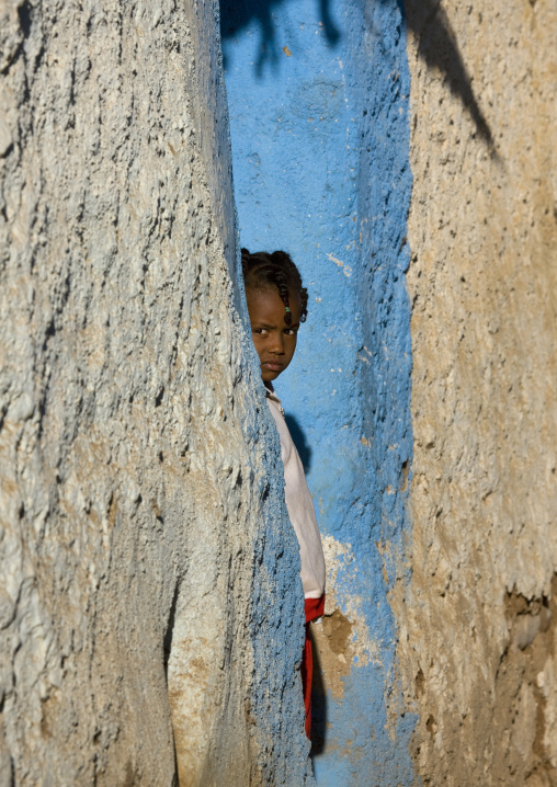 Young Girl Hiding Behind A Wall, Harar, Ethiopia