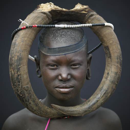 A Mursi Woman With Buffalo Horns Headdress, Omo Valley, Ethiopia