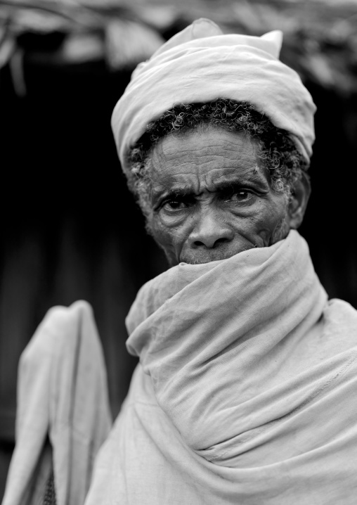 Black And White Portrait Of A Borana Man With Mouth Covered By A White Wrap Around Clothes, Moyale, Ethiopia