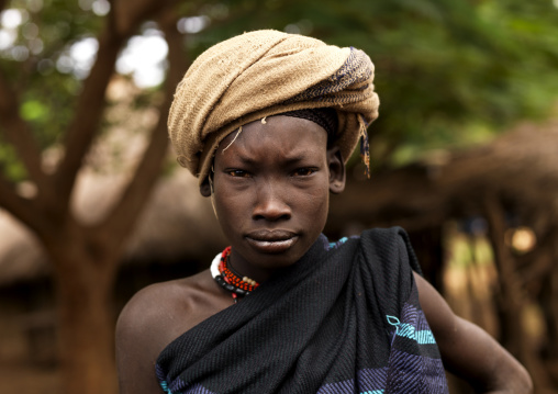 Portrait Of A Young Bodi Tribe Man With Turban And Strong Look, Omo Valley, Ethiopia
