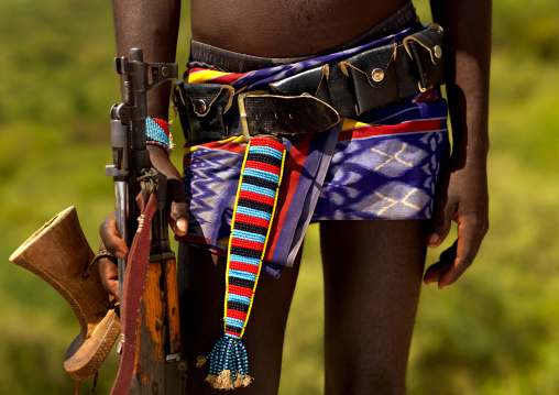 Detail Of The Belt Of A Banna Tribe Warrior With Headrest And Kalashnikov, Omo Valley, Ethiopia