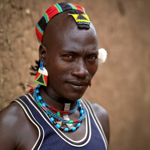 Portrait Of Young Hamer Man Wearing Beaded Ornaments Ethiopia