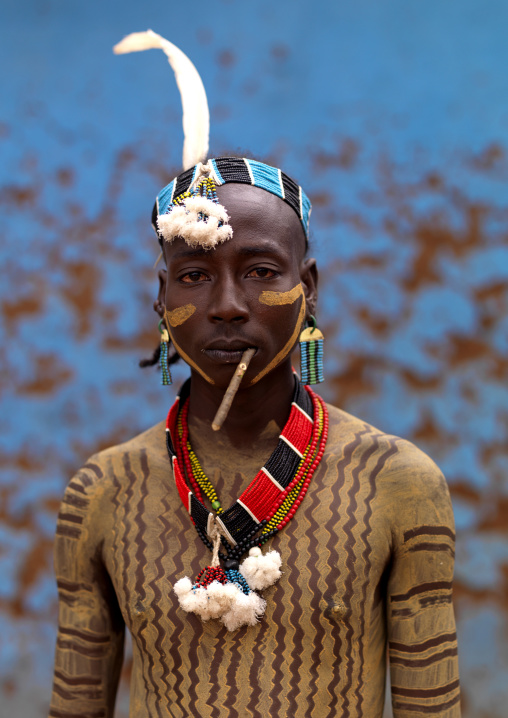 Hamar Tribe Man With White Body Painting, White Feather And Traditional Necklace In Turmi, Omo Valley, Ethiopia